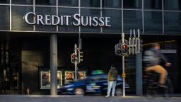 A picture taken on October 25, 2022 shows a sign of Switzerland's second-biggest bank Credit Suisse on a branch in Basel. 