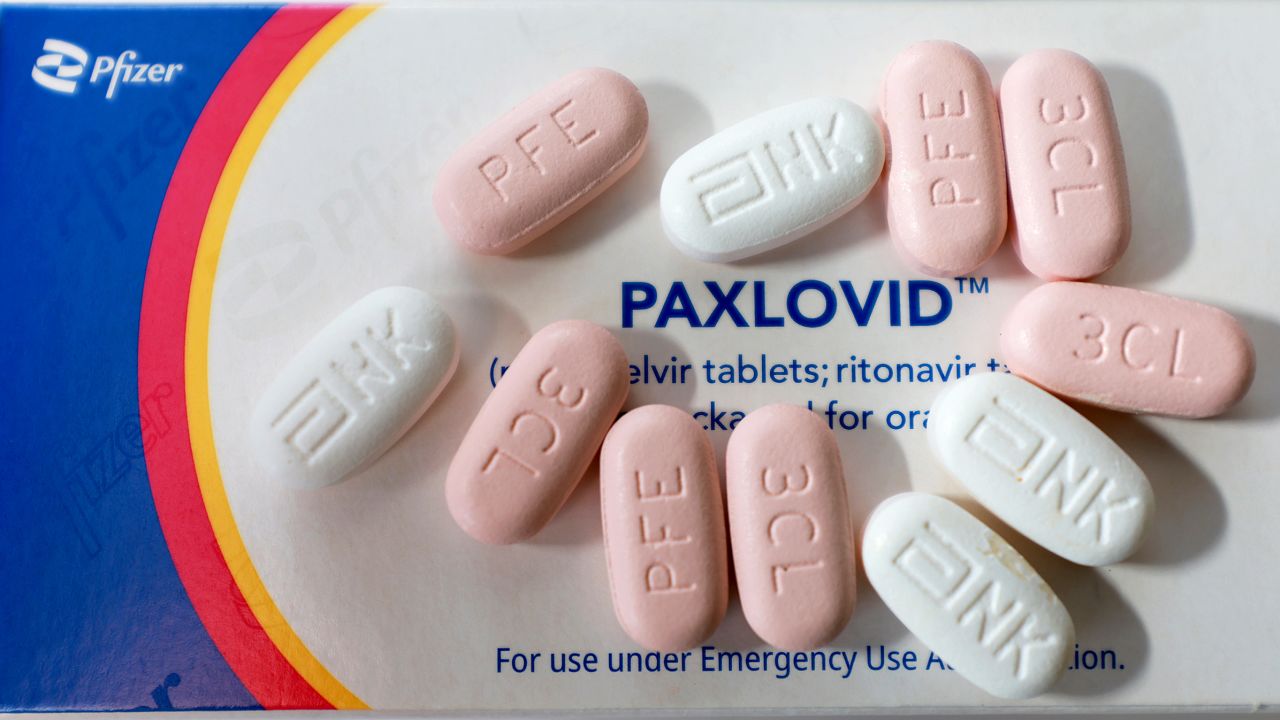PEMBROKE PINES, FLORIDA - JULY 07: In this photo illustration, Pfizer's Paxlovid is displayed on July 07, 2022 in Pembroke Pines, Florida. The US Food and Drug Administration revised the emergency use authorization for Paxlovid, Pfizer's Covid-19 antiviral treatment, to allow state-licensed pharmacists to prescribe the treatment to people. (Photo by Joe Raedle/Getty Images)