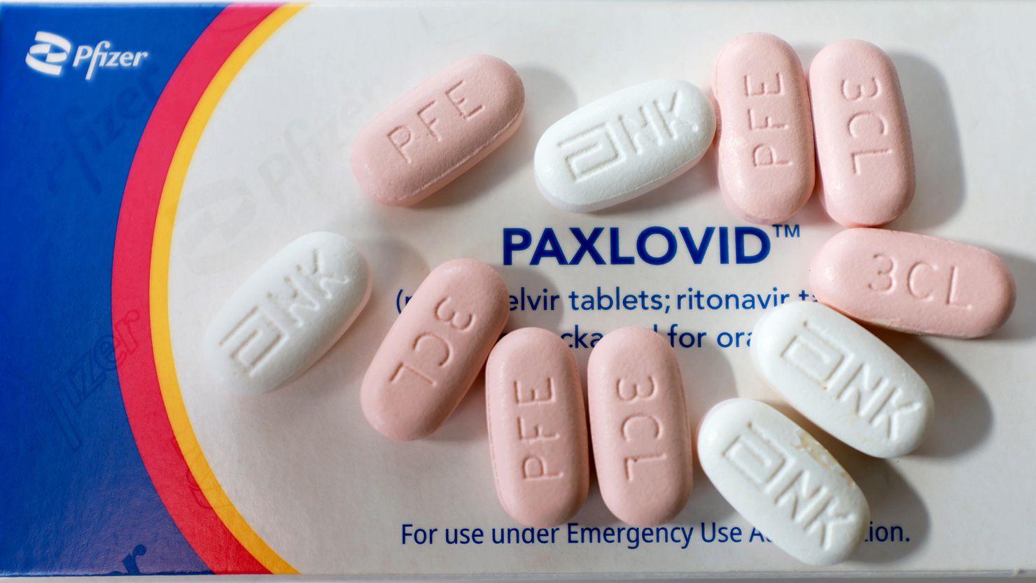 PEMBROKE PINES, FLORIDA - JULY 07: In this photo illustration, Pfizer's Paxlovid is displayed on July 07, 2022 in Pembroke Pines, Florida. The US Food and Drug Administration revised the emergency use authorization for Paxlovid, Pfizer's Covid-19 antiviral treatment, to allow state-licensed pharmacists to prescribe the treatment to people. (Photo by Joe Raedle/Getty Images)
