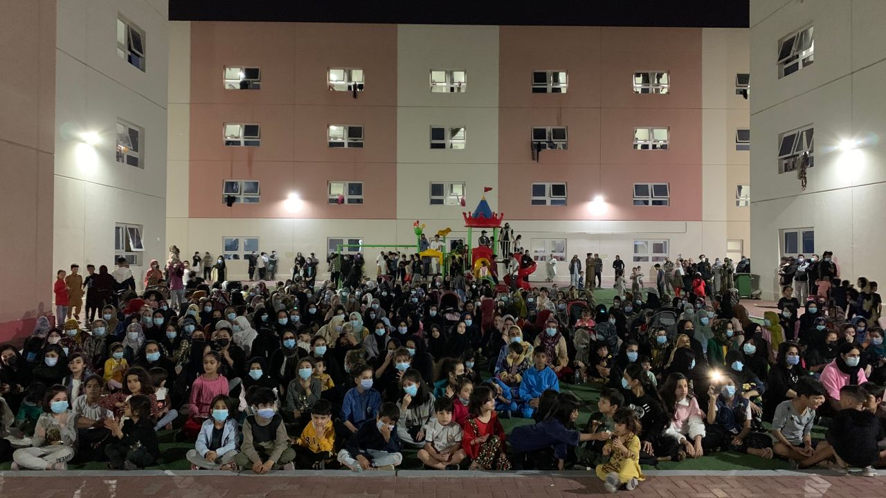 Afghans rallied at the Emirates Humanitarian City refugee camp in the UAE capital of Abu Dhabi on Feburary 13, 2022, to protest their non-transfer to the US.