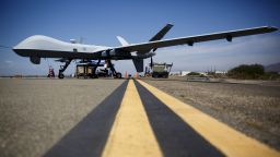In this July 2015 photo, a General Atomics MQ-9 Reaper stands on the runway during "Black Dart", a live-fly, live fire demonstration of 55 unmanned aerial vehicles, or drones, at Naval Base Ventura County Sea Range, Point Mugu, near Oxnard, California.