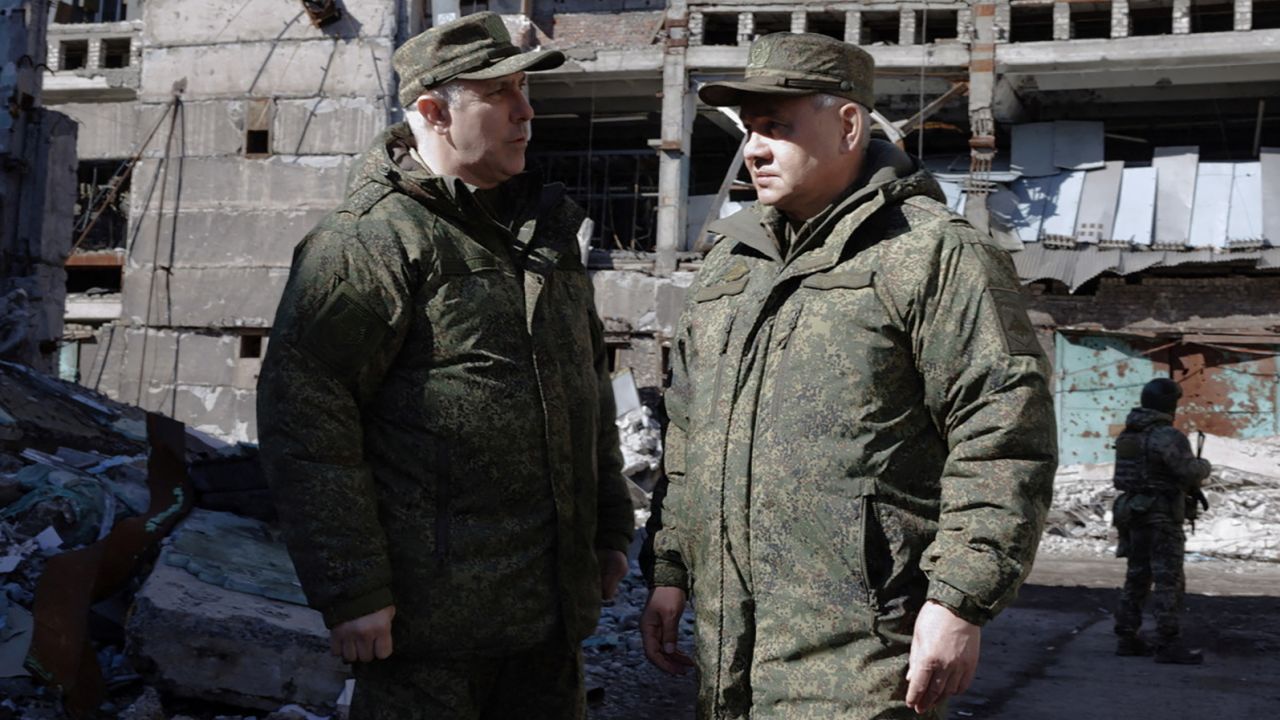 Russia's Defense Minister Sergei Shoigu, right, is seen at a purported forward command post of Russian armed forces deployed in Ukraine at an unknown location in a handout image published March 4.