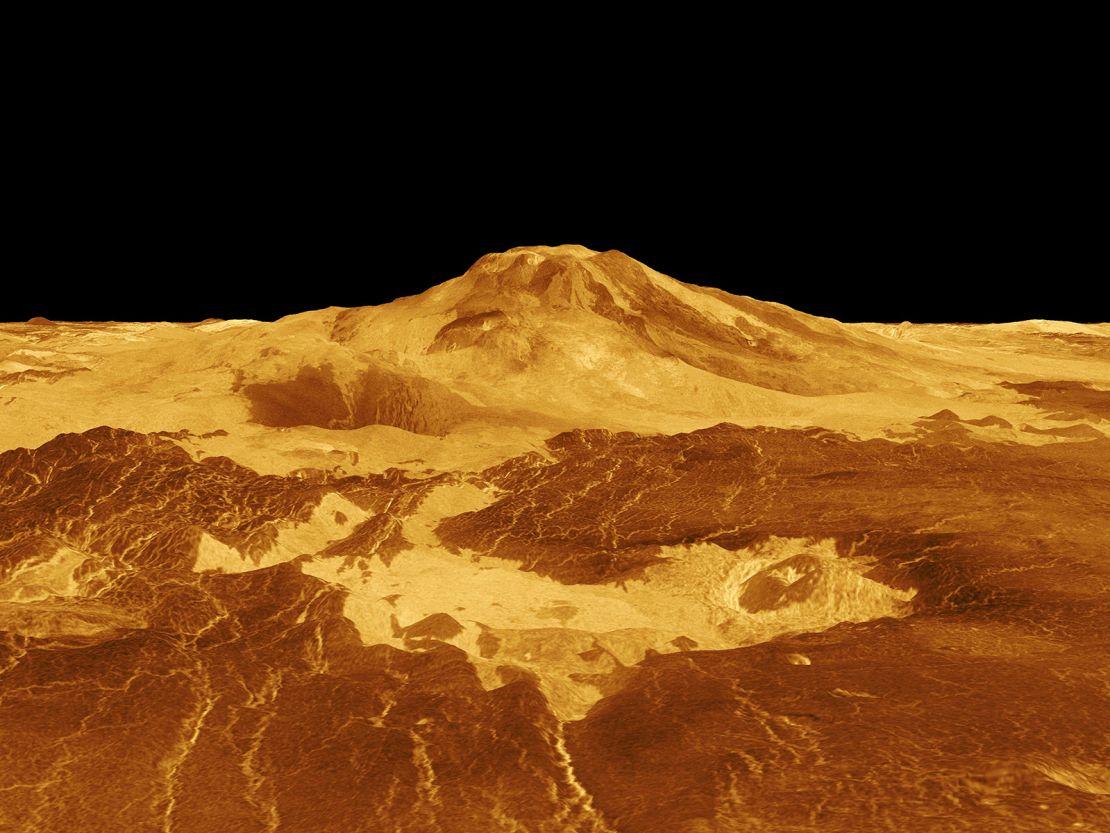 A computer-generated 3D image of Maat Mons depicts how the volcano and lava flows extend for hundreds of kilometers across the fractured plains.