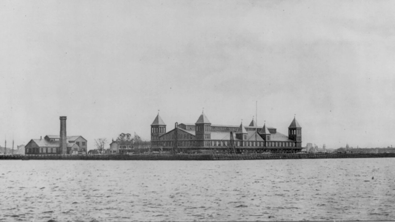 This archival photo from 1891 shows a view of the Ellis Island immigration station in New York Harbor.