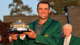 AUGUSTA, GEORGIA - APRIL 10: Scottie Scheffler poses with the Masters trophy during the Green Jacket Ceremony after winning the Masters at Augusta National Golf Club on April 10, 2022 in Augusta, Georgia. (Photo by David Cannon/Getty Images)