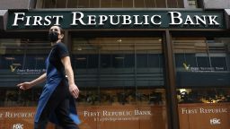 A person walks by the First Republic Bank headquarters on March 13, 2023 in San Francisco, California. 