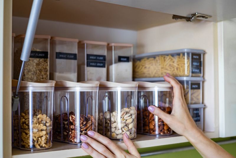 Dry food storage outlet bins