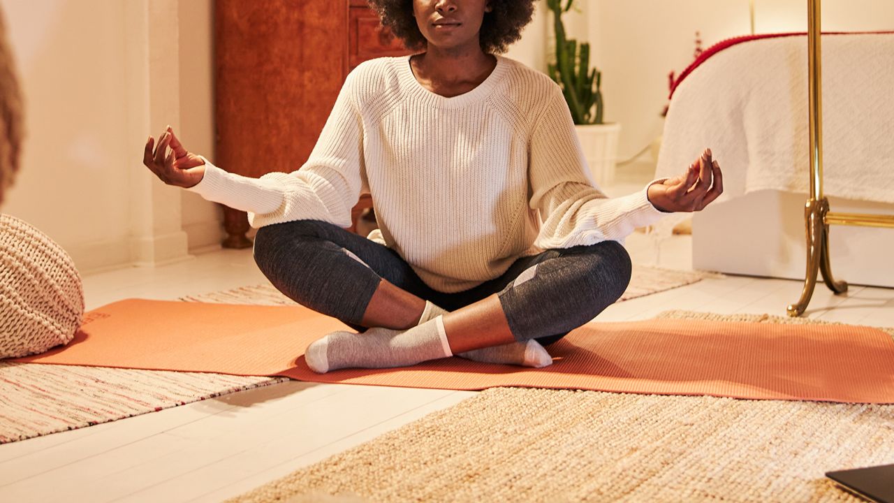 Shortly before bedtime, activities such as light yoga can help calm the racing mind. 