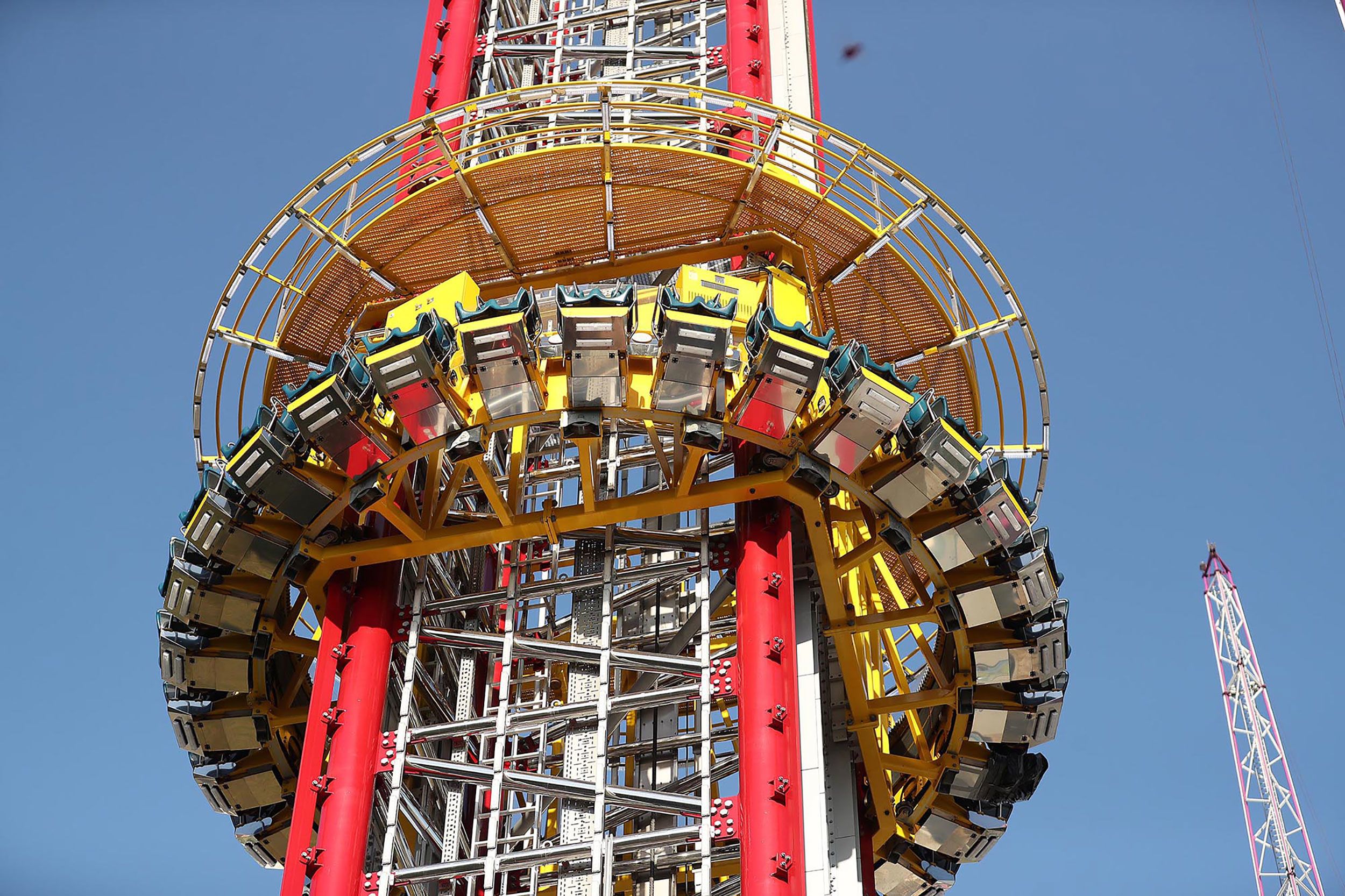 Giant stuffed animals test ride roller coasters while theme parks are closed