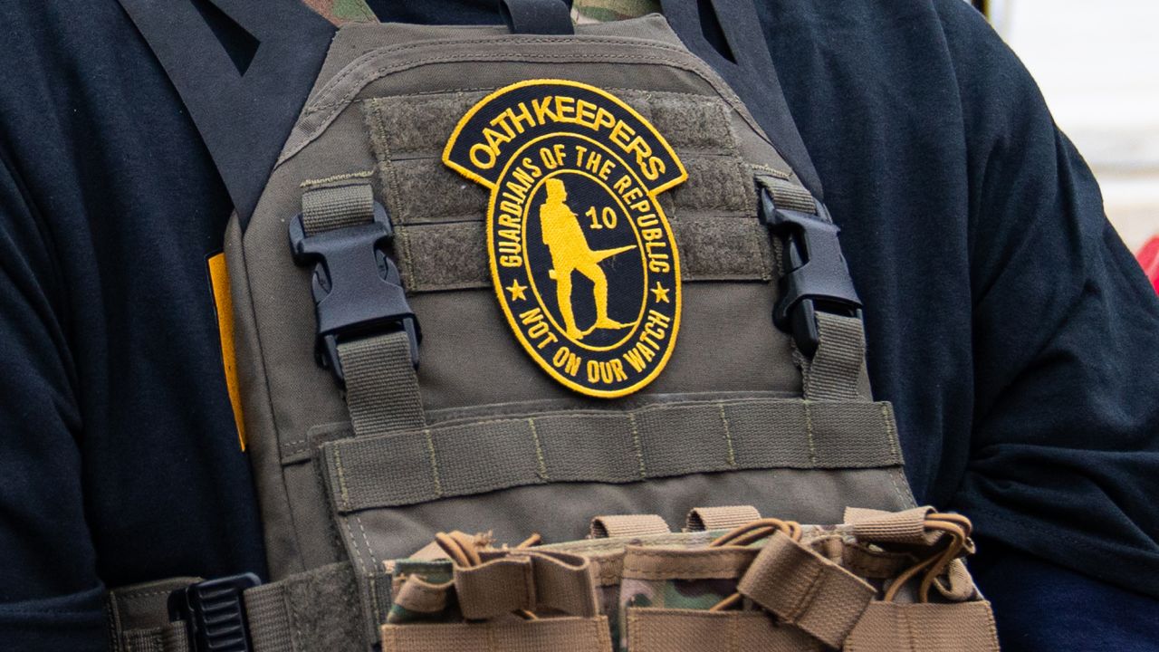 A member of the right-wing group Oath Keepers stands guard during a rally in front of the U.S. Supreme Court Building on January 5, 2021 in Washington, DC.