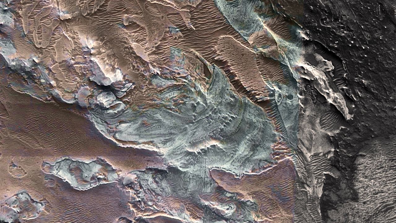 Salt deposits, shown in light blue, preserve where a glacier likely existed near the Martian equator. 