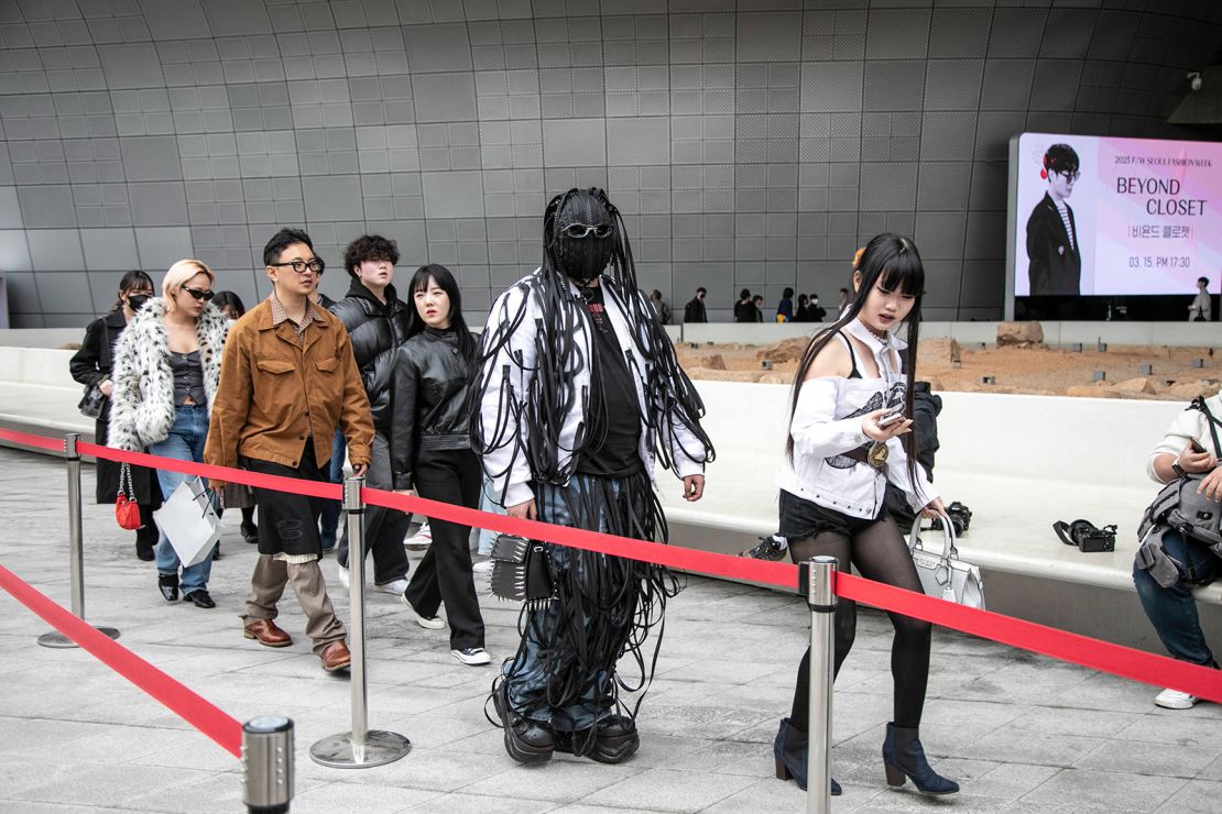 An unusual black fringed outfit.