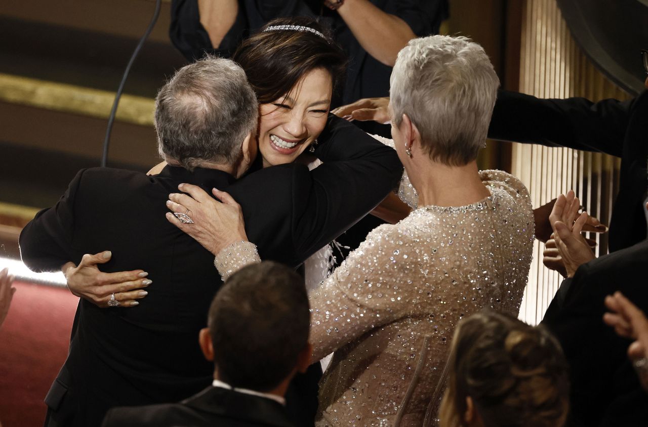 Michelle Yeoh reacts after winning the Oscar for best actress for her role in 