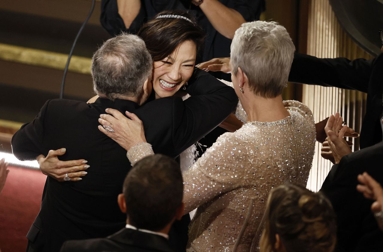 Michelle Yeoh reacts after winning the Oscar for best actress for her role in