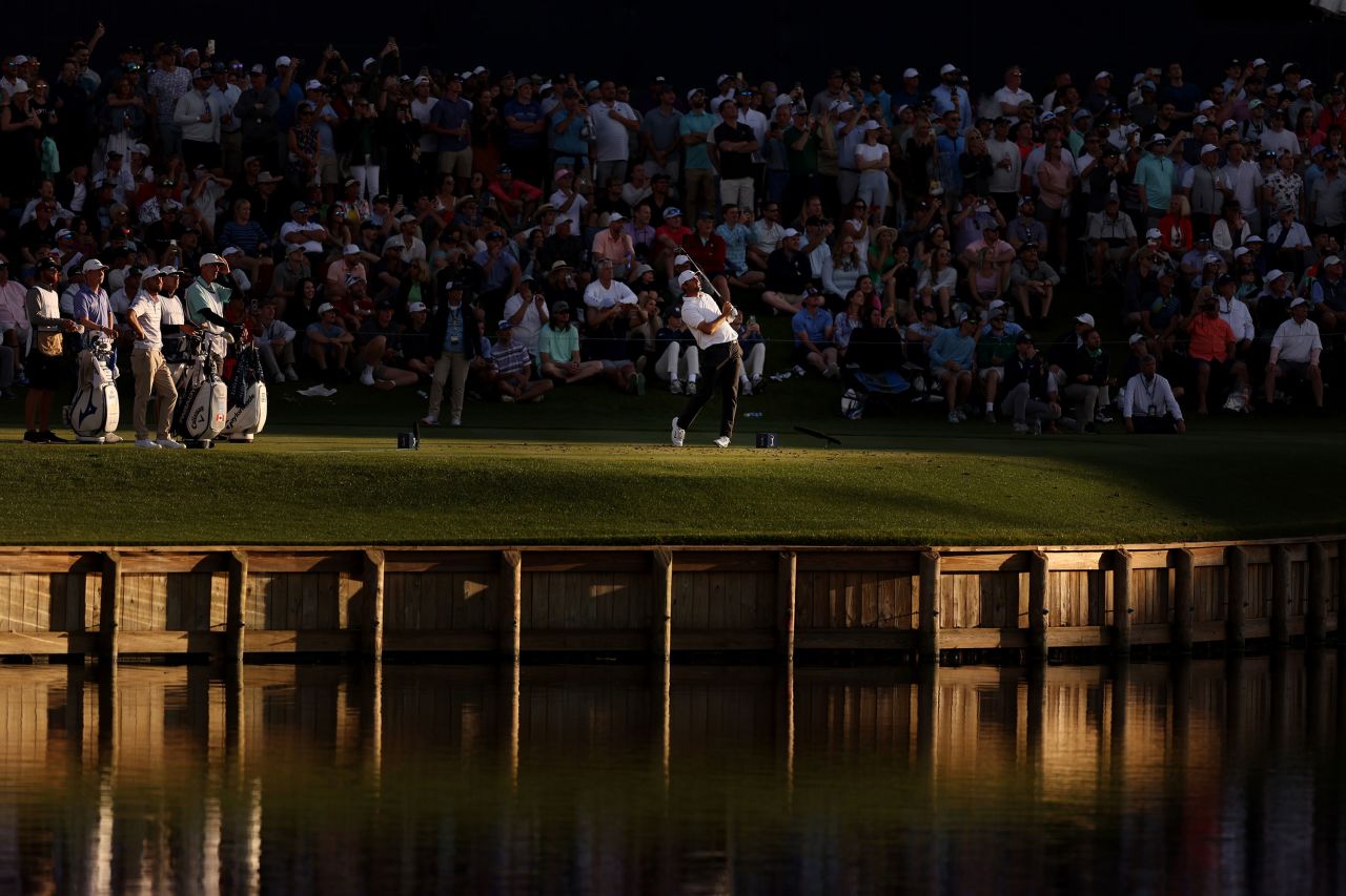 American golfer Scottie Scheffler plays his shot from the 17th tee during the Players Championship at TPC Sawgrass in Ponte Vedra Beach, Florida, on Saturday, March 11.