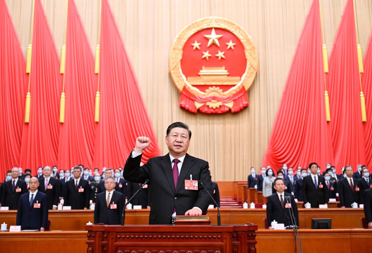 Chinese leader Xi Jinping makes a public pledge of allegiance to the Constitution at the Great Hall of the People in Beijing on Friday, March 10. Xi's unprecedented third term as China's president was officially endorsed by the country's political elite, solidifying his control and making him the longest-serving head of state of Communist China since its founding in 1949.