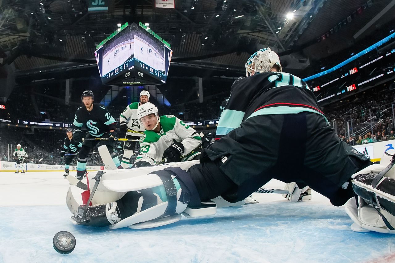 Wyatt Johnston of the Dallas Stars scores a goal on Martin Jones of the Seattle Kraken during the second period of a game in Seattle on Monday, March 13. Dallas won 5-2.