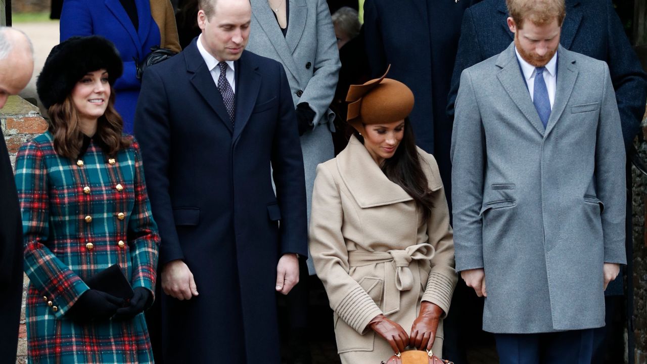 Prince William and Prince Harry bow while Kate and Meghan curtsy as Queen Elizabeth II leaves the family's traditional Christmas Day church service in 2017.