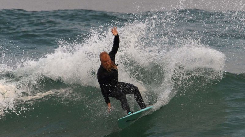 Aussie surfer sets record with mammoth 30-hour surfing session, then goes back for more | CNN