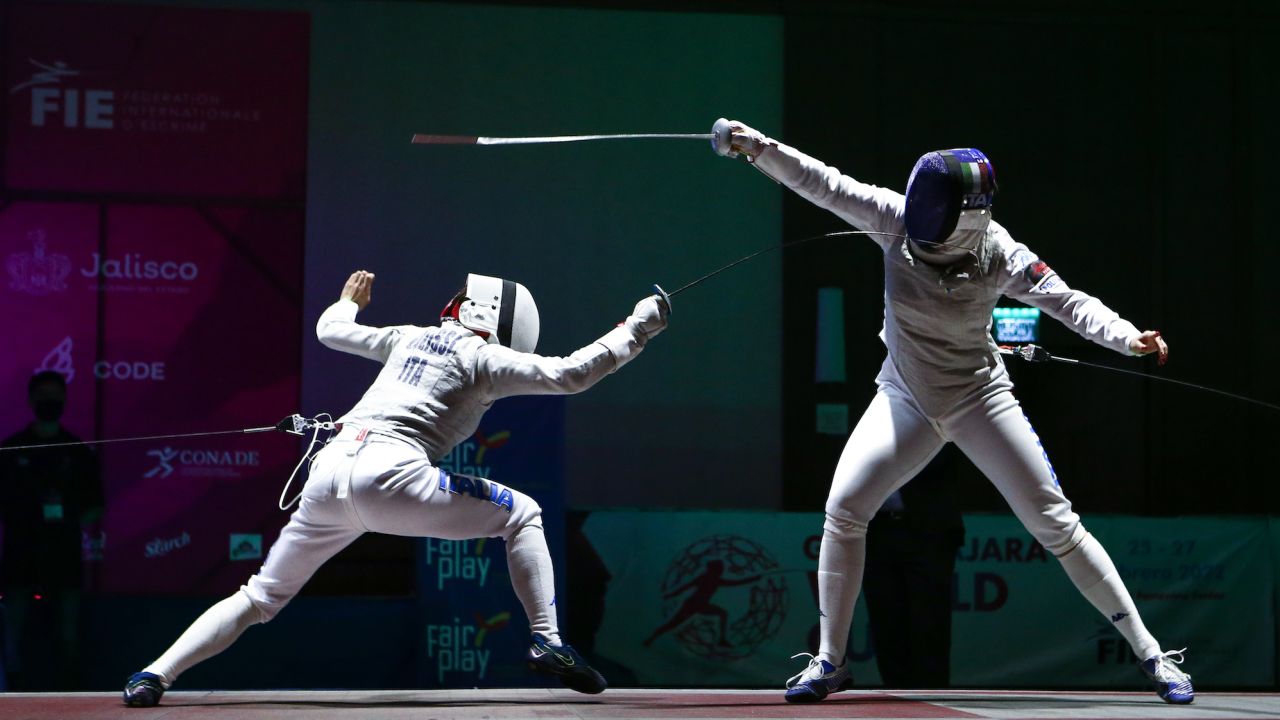 Olga Rachele Calissi of Italy (left) fences fellow Italian Alice Volpi in a semifinal bout at the Women's Foil World Cup at the Fiesta Americana Guadalajara Hotel on February 26, 2022.