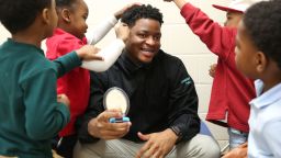 Johnathon Hines interacts with his pre-K students during playtime at Barack H. Obama Elementary School of Technology in Dekalb County on March 13, 2023.
