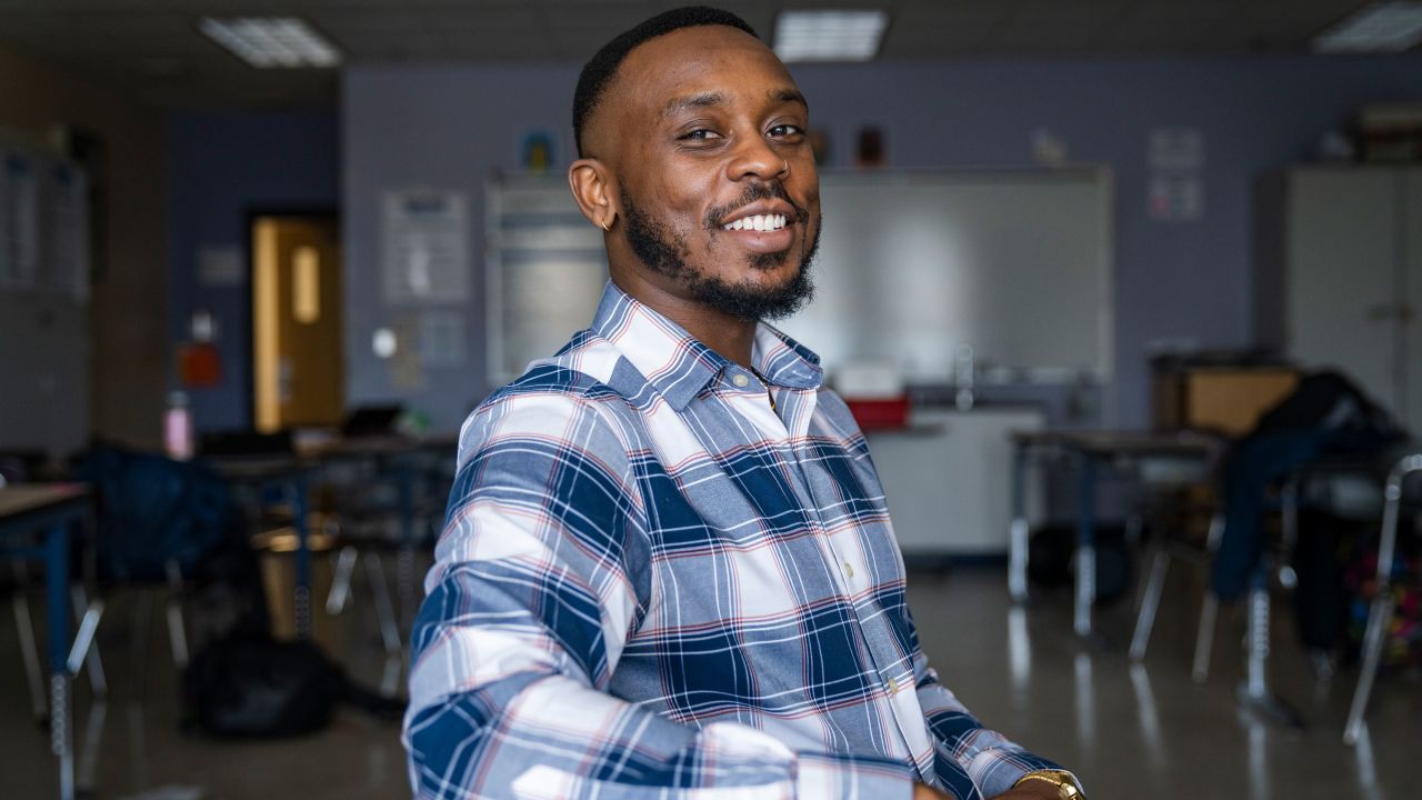 Eighth grade science teacher Jamaal Grant sits in a classroom for a photo at Lilla G. Frederick Pilot Middle School in Boston, Mass., March 16, 2023.
