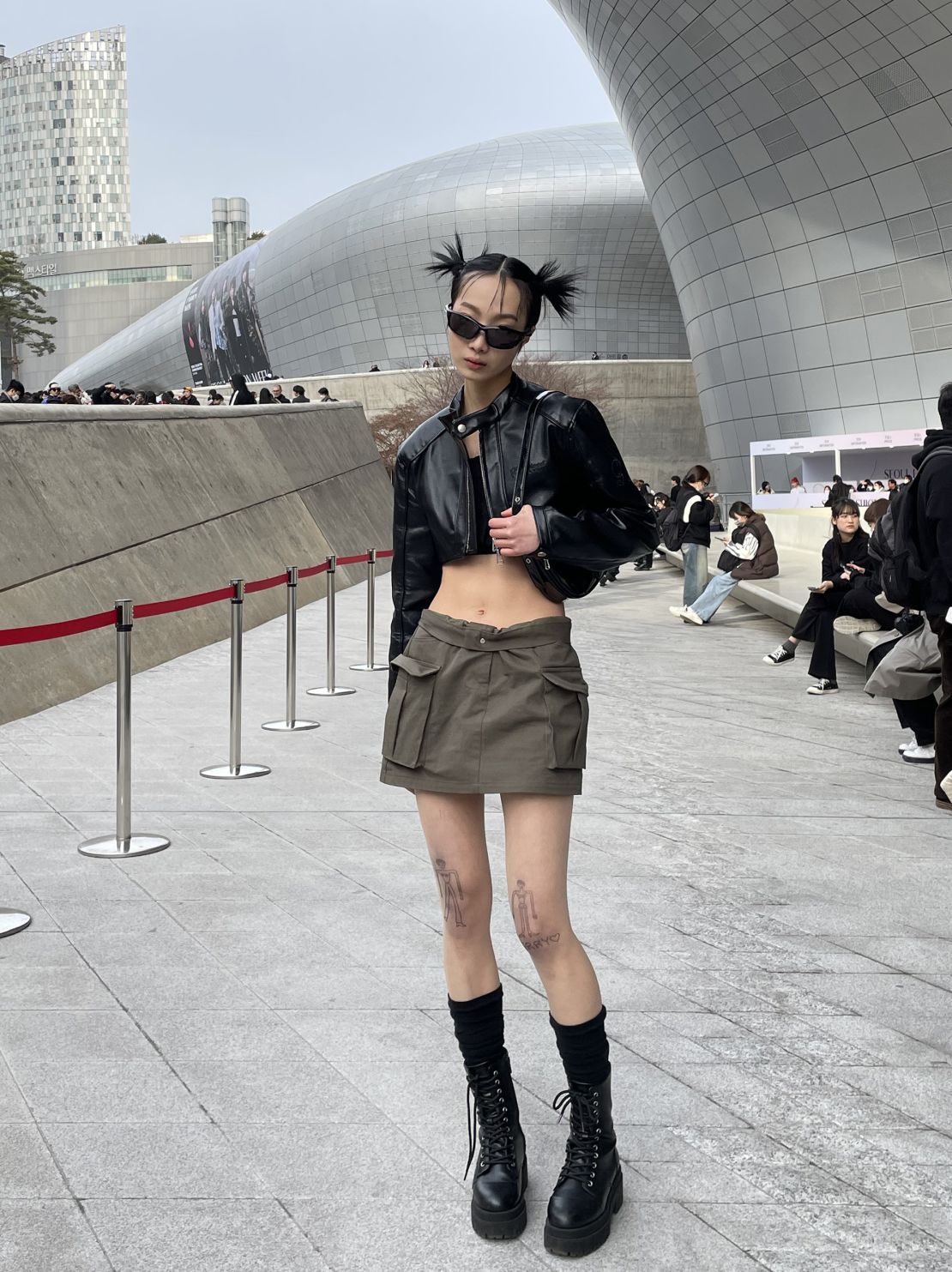 Jerry, a 23-year-old model, wore a skirt and cropped leather jacket.