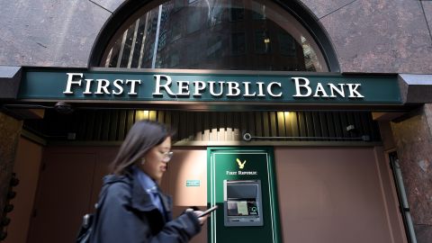 A pedestrian walks by a First Republic Bank office on March 16, 2023 in San Francisco, California. A week after Silicon Valley Bank and Signature Bank failed, First Republic Bank is considering a sale following a dramatic 60 percent drop in its stock price over the past week. The bank also received $70 billion in emergency loans from JP Morgan Chase and the Federal Reserve. (Photo by Justin Sullivan/Getty Images)