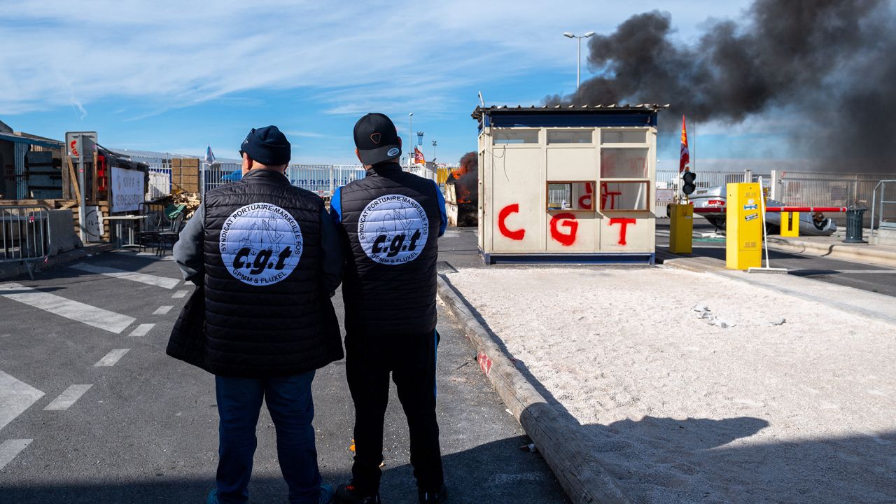 Dockers blockade  the port of Marseille on Friday in protest at the pension changes.