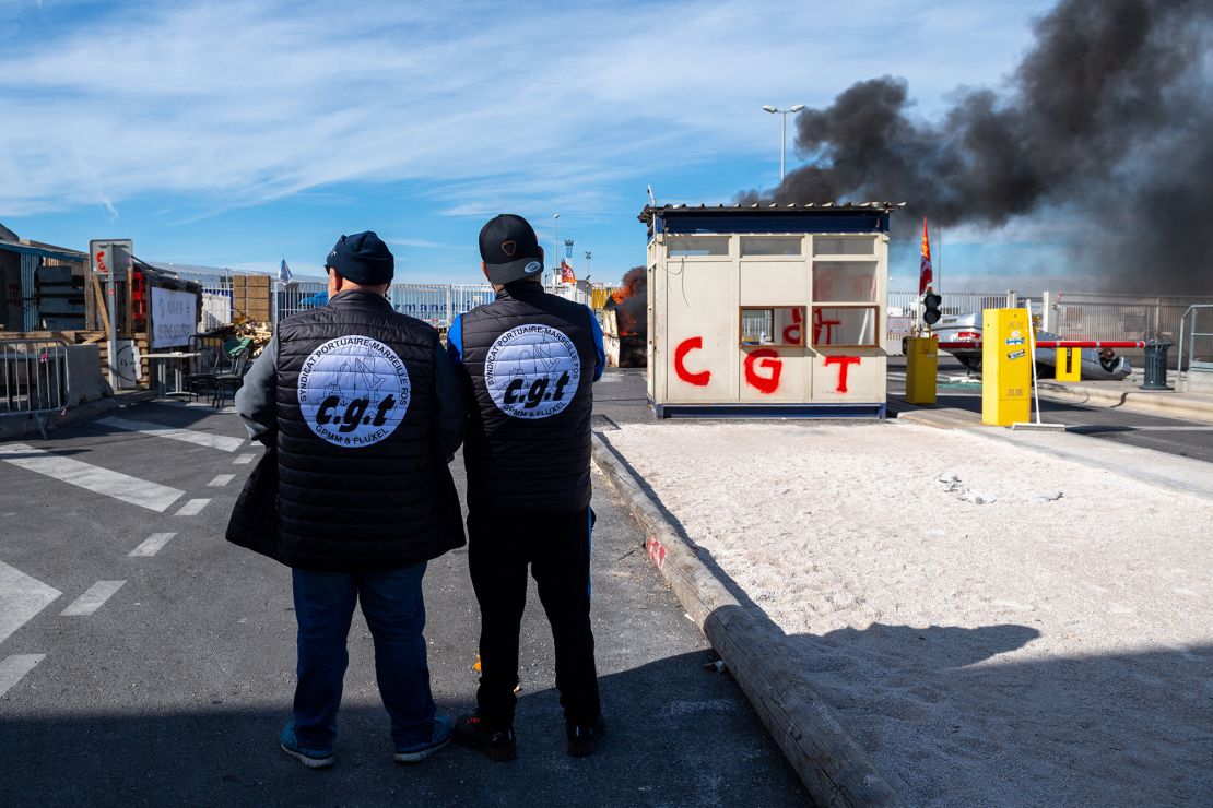 Dockers blockade  the port of Marseille on Friday in protest at the pension changes.
