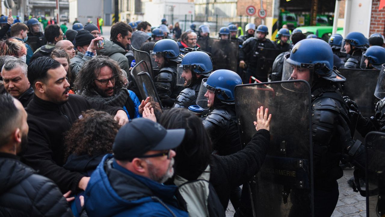 Police dislodge garbage collectors who are refusing to work at the Ivry-sur-Seine incinerator near Paris on Friday.