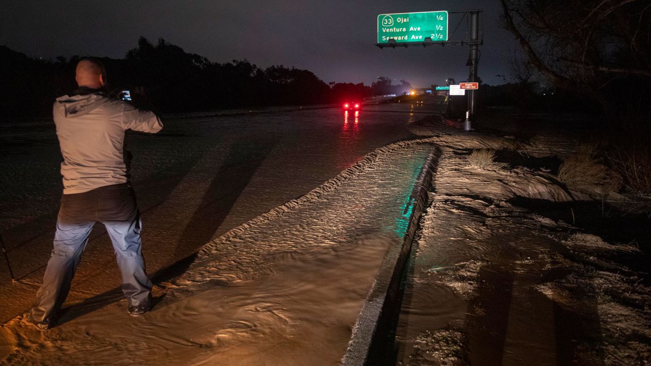 Water from the Ventura river rises on January 9 to the 101 freeway in Ventura, flooding all lanes.