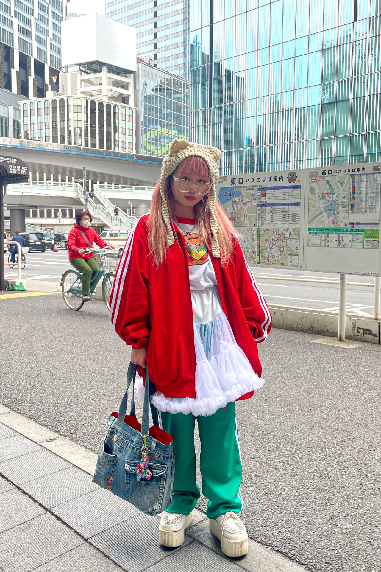 Akane, who didn't provide her surname out of concern for her privacy, described her outfit as "salty and sweet." Her ensemble comprised a tracksuit worn over a baby tee with a print of a hamburger and a frilly white skirt. 