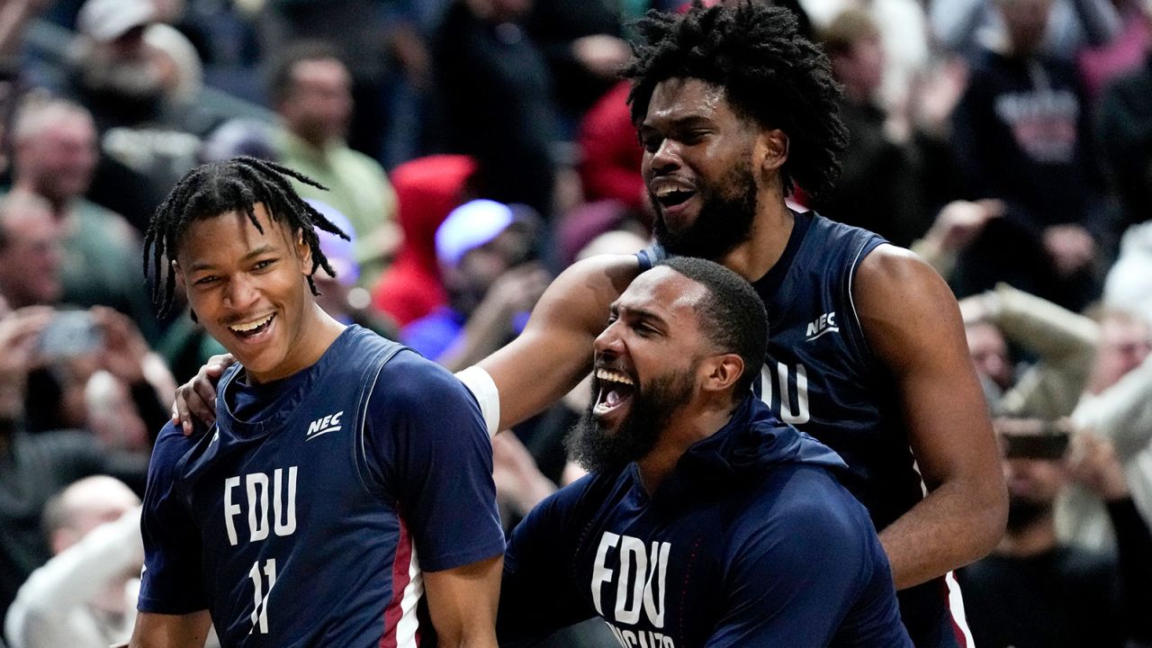 Fairleigh Dickinson forward Sean Moore, #11, celebrates a historic win against Purdue (63-58) after a first-round college basketball game in the NCAA Tournament on Friday in Columbus, Ohio.