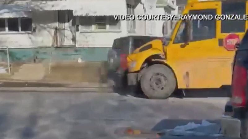 Watch moment stolen car crashes into school bus filled with kids | CNN