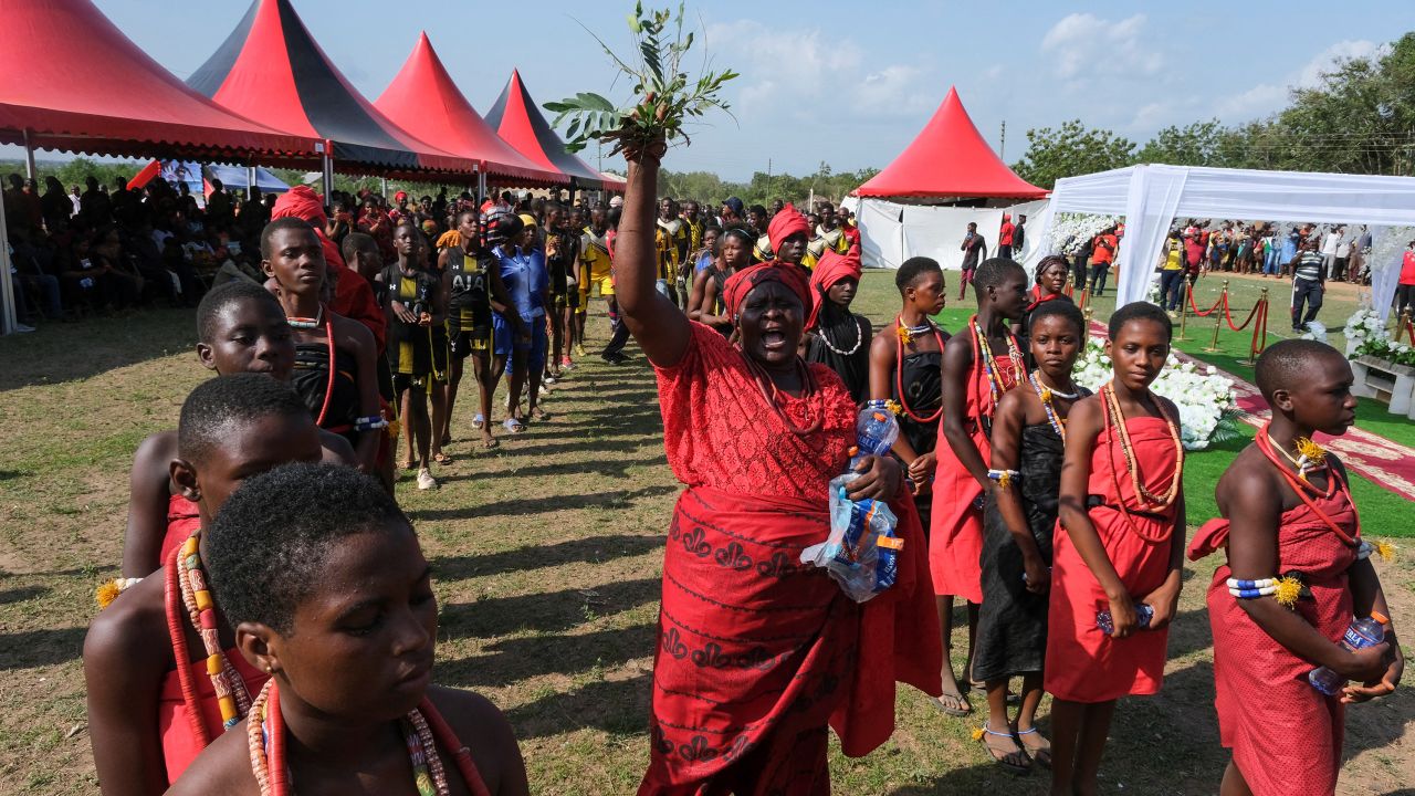 Locals perform traditional rites as Atsu is laid in his tomb in Ada.