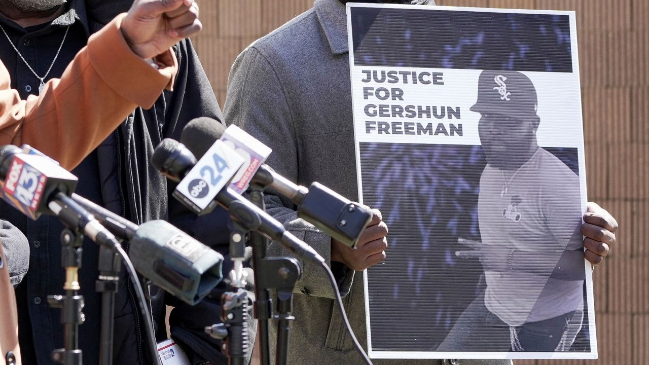 A sign demanding justice for Gershun Freeman is held up at a family news conference in March.