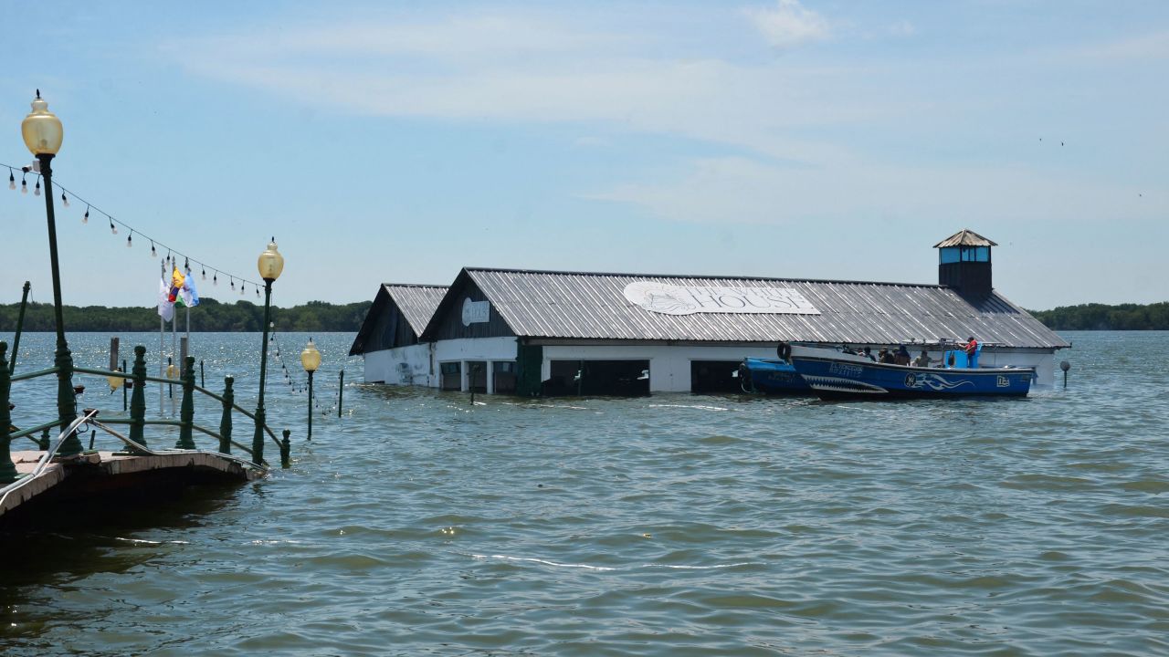 A scene of flooding at the Puerto Bolivar dock after the earthquake.