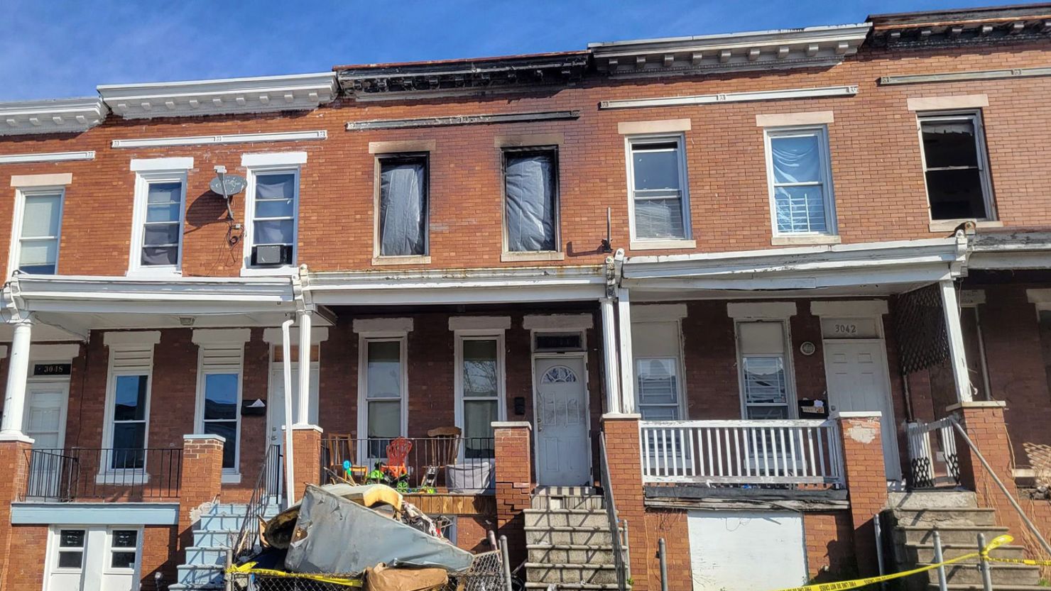 Firefighters rescued five critically injured people from a pre-dawn fire in Baltimore. Three of the victims were children, who later died of their injuries.