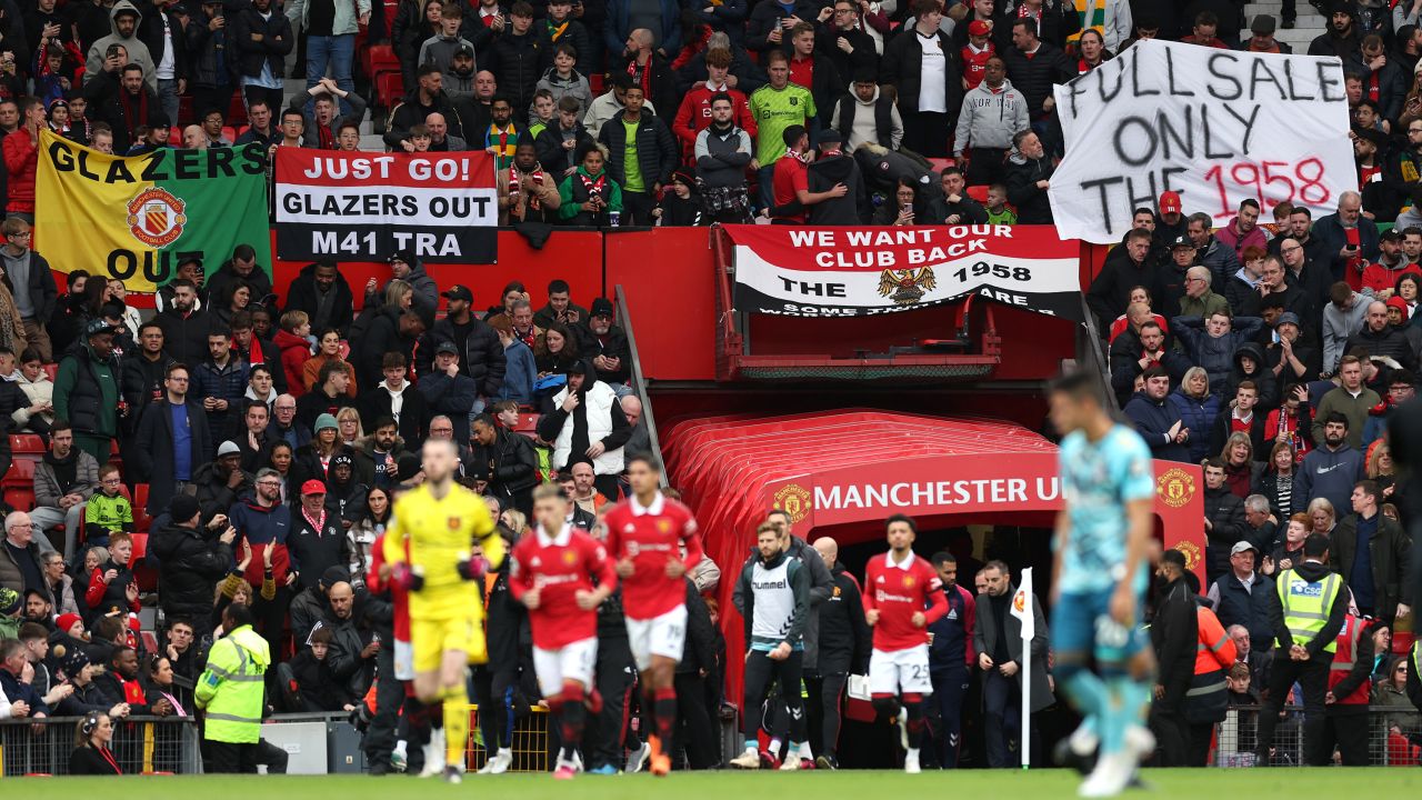 Manchester United fans display banners protesting about the current owners of the club earlier this month.