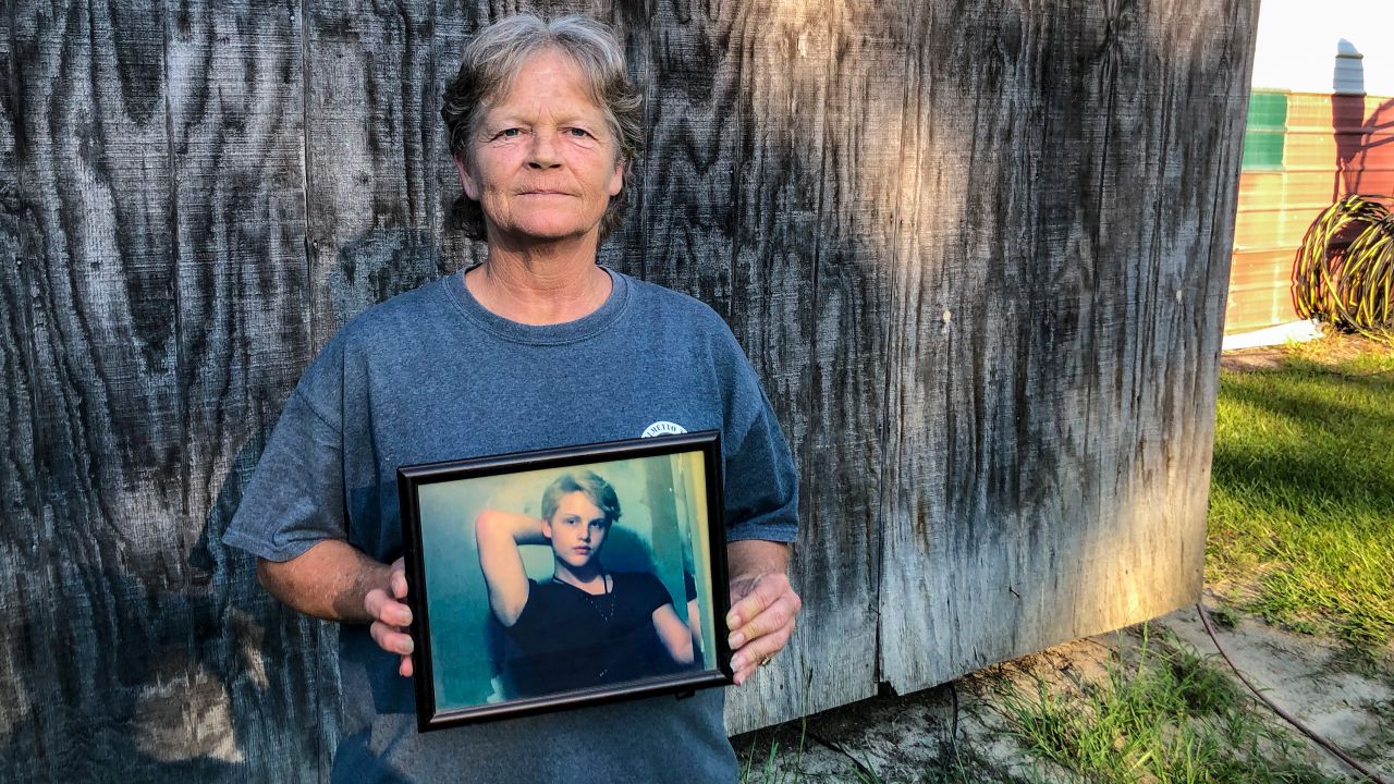 Sandy Smith holds a photo of her late son, 19-year-old Stephen Smith, on Thursday,  June 24, 2021. 