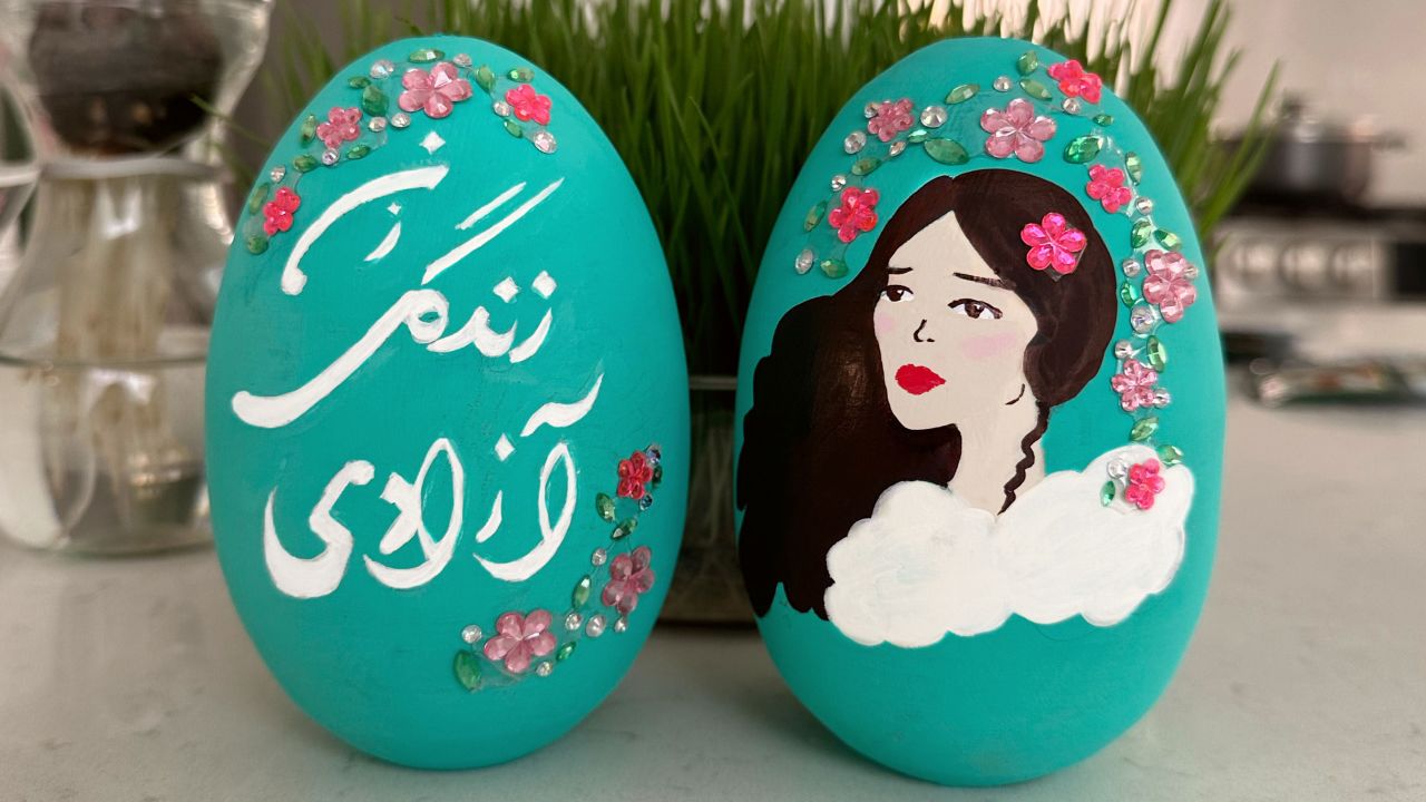 Decorative Nowruz eggs with "Zan Zendegi Azadi," or "Woman Life Freedom" in Farsi, painted on them. The refrain became the rallying cry at protests sparked by Mahsa Jina Amini's death.
