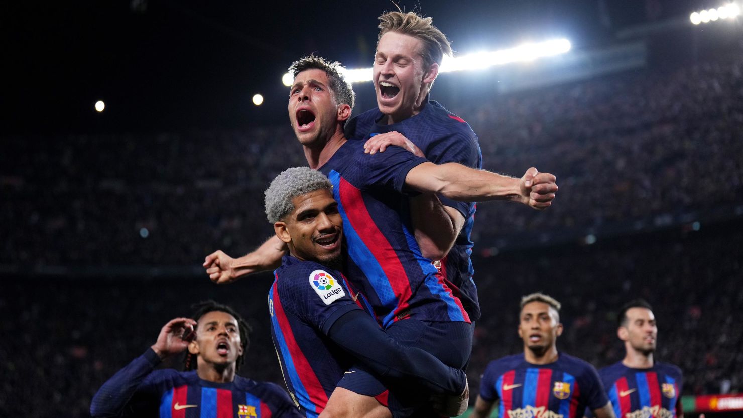 Barcelona players celebrate during their match against Real Madrid on Sunday.