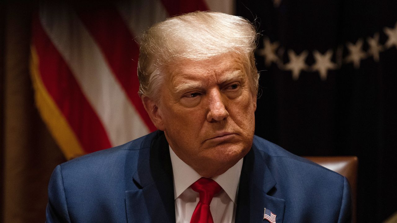 President Donald Trump listens during a meeting with members of the National Association of Police Organizations Leadership in the Cabinet Room of the White House July 31, 2020 in Washington, DC.