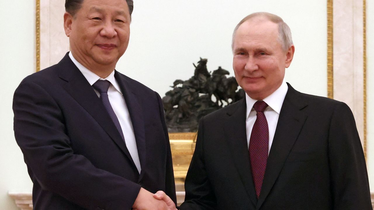 TOPSHOT - Russian President Vladimir Putin meets with China's President Xi Jinping at the Kremlin in Moscow on March 20, 2023. (Photo by Sergei KARPUKHIN / SPUTNIK / AFP) (Photo by SERGEI KARPUKHIN/SPUTNIK/AFP via Getty Images)