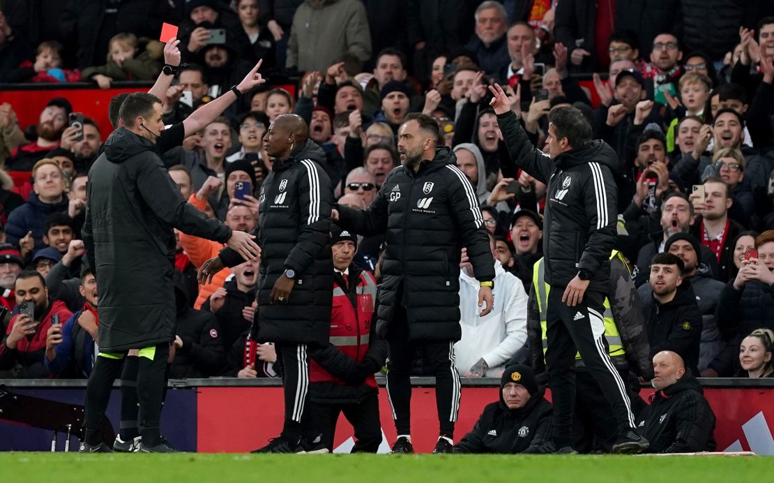 Fulham manager Marco Silva (R) is shown a red card during the FA Cup quarterfinal.