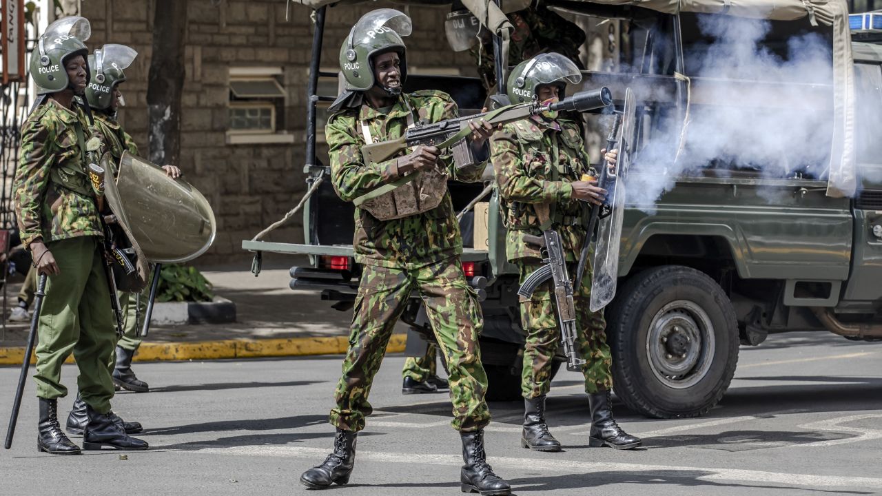 A Kenyan Police officer fires teargas to protesters in Nairobi, Kenya, on March 20, 2023.