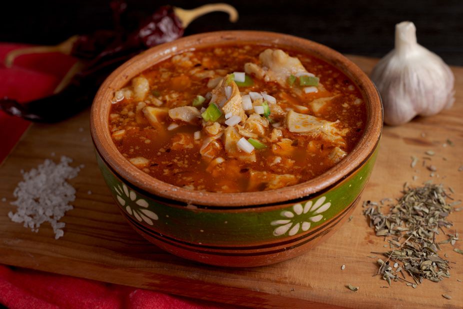 <strong>Menudo: </strong>Another hearty stew-type dish favored to cure the weekend hangover, menudo comes with beef tripe and hominy simmered in a broth turned red by a melody of red chiles, oregano and garlic.
