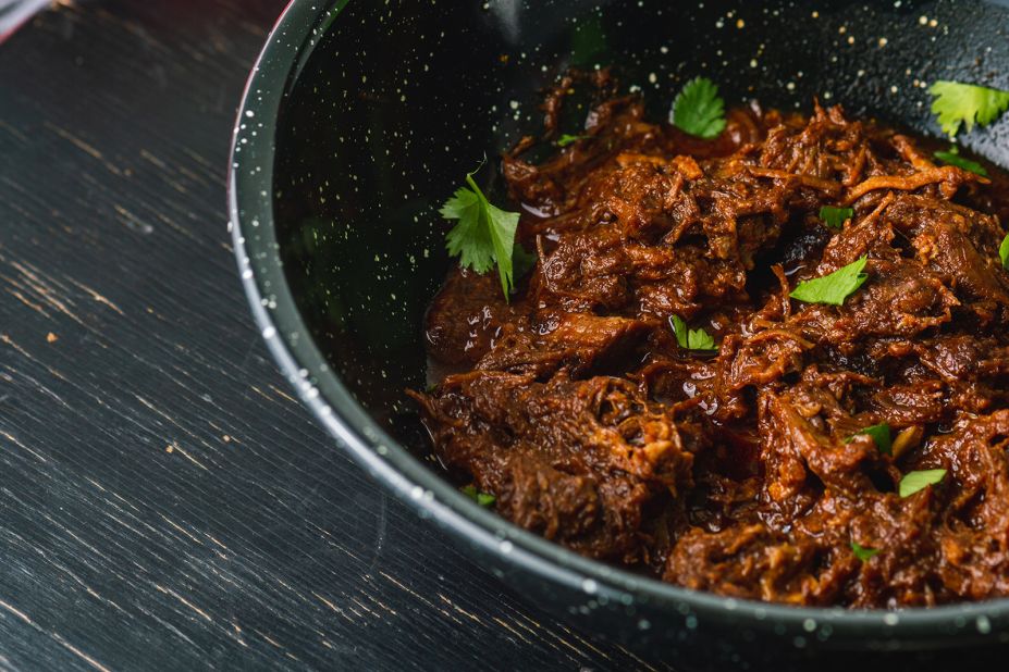 <strong>Barbacoa:</strong> Historically, barbacoa references the style of barbecue by the Taino people of the Caribbean. In Mexican cooking, barbacoa refers to the slow-cooking of meat over an open flame or in a hole in the ground.