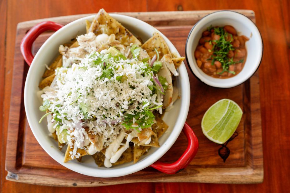 <strong>Chilaquiles: </strong>Usually consumed for breakfast, chilaquiles are made with stale tortillas that are cut into strips, fried and tossed in a red or green sauce for a balance of crispy and soft at once.